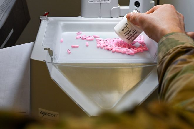 A pharmacist filling a prescription